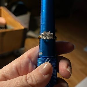 Goldtone ring with three CZ stones